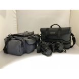 Two Canon cameras with lenses, accessories etc, with carrying cases.