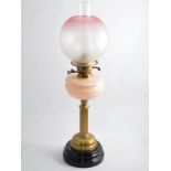 Edwardian oil lamp, acidet shade, opaque reservoir, brass column, circular base, with chimney, 69cm.