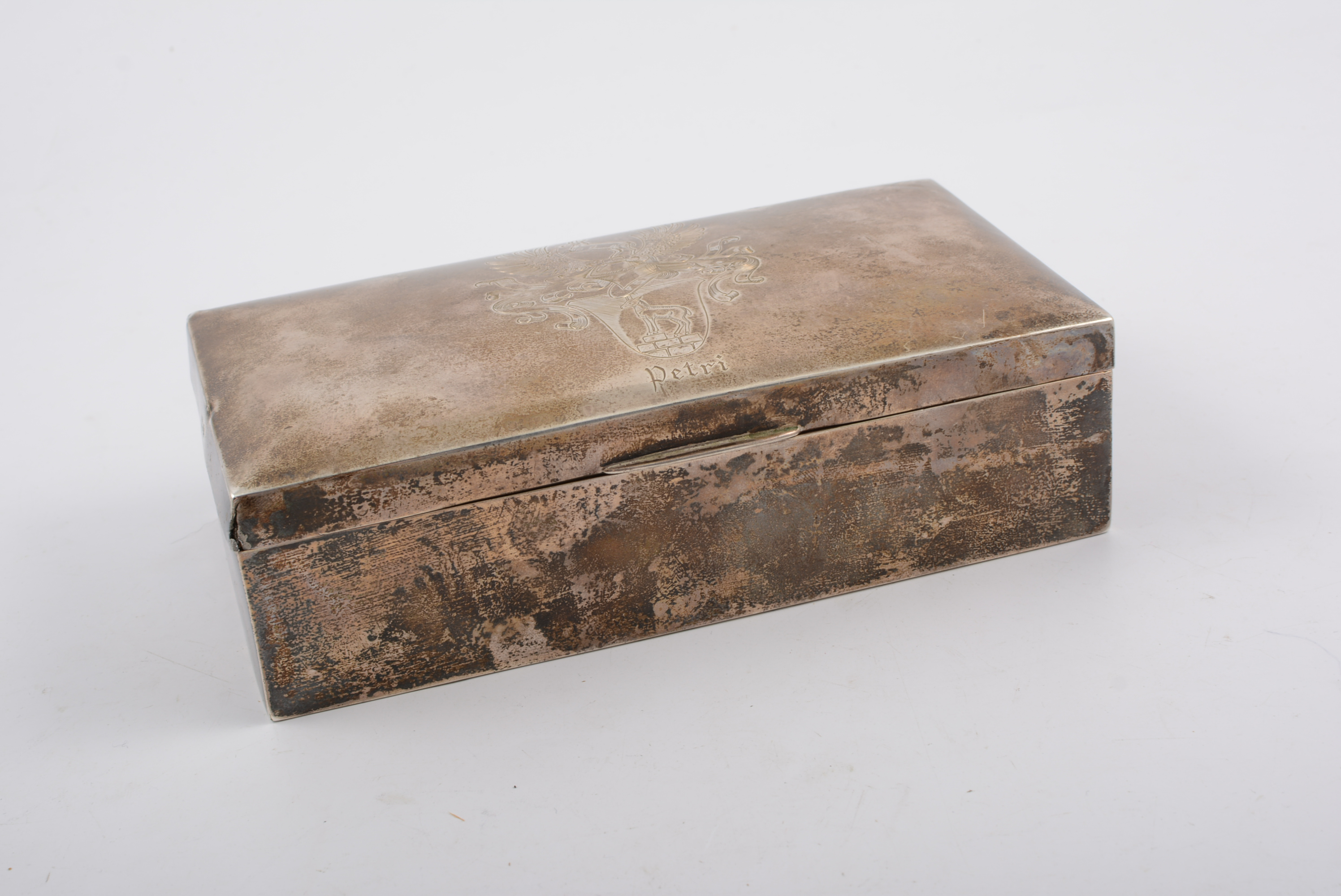 Silver cigarette box, Birmingham 1945, engraved armorial, cedarwood lined, width 18cm.