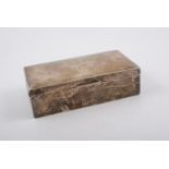 Silver cigarette box, Birmingham 1945, engraved armorial, cedarwood lined, width 18cm.