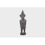 Carved African figure, standing female form, scarified body, possibly Senufo or Baule, Ivory Coast,