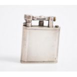 A 1940s silver Dunhill lighter, engine turned design, 4cm x 5cm, hallmarked London 1945.