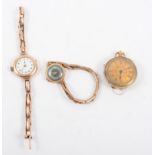 Two wrist watches and a fob watch, an open face fob watch in an 18K case, metal inner case,