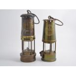 Two miner's lamps.