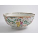 A Chinese Famille Rose export bowl, 26cm diameter, decorated with figures and flowers.