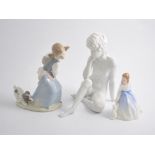 Lladro porcelain model, Girl and Puppy 4982, 21cm; Kaiser bisque figure; a Royal Doulton figure,