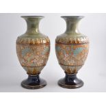 A pair of Doulton & Slaters stoneware baluster vases,