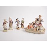 Sitzendorf group, reclining couple, 15cm and four small German porcelain figures.