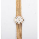 Omega - A lady's 9 carat yellow gold bracelet watch,