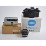 Collection of camera equipment, including Minolta X-700, Polaroid 600 buiness edition, other lenses,