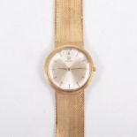 Omega - A gentleman's 9 carat gold bracelet watch,