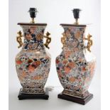 Pair of Chinese porcelain lamp bases, and a blue and white lamp base.