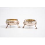Pair of silver cauldron salts, plain with bead edge and gilded bowls on three shell and hooved feet,