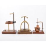 A field microscope, pair of binoculars, copper mortar by W G Pye and Co of Cambridge,