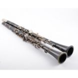Two clarinets - A Buffet Crampon & Cie of Paris black clarinet with case, model B10,