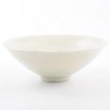 Chinese celadon glaze bowl, conical form, plain outer body, impressed moulded design to well,
