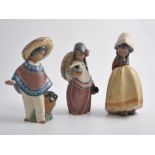 Three Lladro stoneware figures, Boy and Girl with sombreros carrying jugs,