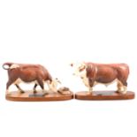 Pair of Beswick Connoisseur models, Hereford Bull, 20cm and Hereford Cow and Calf, wooden bases,