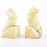 Pair of alabaster bookends, designed as collared doves, 20cm.