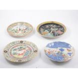 Chinese famille noir porcelain plate, of dished form, decorated with a pair of a Asiatic Pheasants,