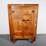 Robert 'Mouseman' Thompson of Kilburn, a large floor-standing panelled corner cupboard, 1960s,