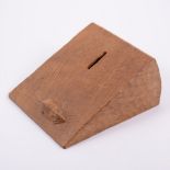 Robert 'Mouseman' Thompson of Kilburn, an oak money box, designed as a wedge of cheese,