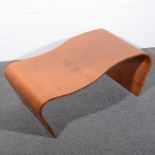 A Contemporary bent ply occasional table, wavy outline, by repute acquired from Heal's,