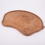 Robert 'Mouseman' Thompson of Kilburn, an oak kidney shaped tea tray, adzed finish,