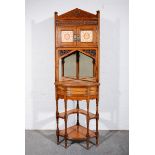 An Indian hardwood and tiled corner cabinet in the Gothic Revival taste,
