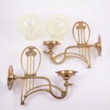 Pair of Art Nouveau brass wall brackets, with lemon tinted opalescent shades,