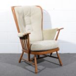Ercol, a Tall Back Easy chair, model 478, honey stained beech frame, loose cushion,