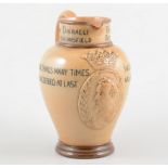 Doulton Lambeth for Mortlocks, a stoneware commemorative jug for Benjamin Disraeli, damaged,