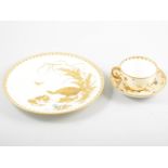 Minton, a cabinet plate, in the Aesthetic style, raised paste gilt with ducks, 24.