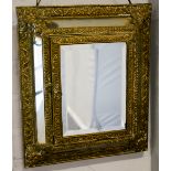 Dutch style brass framed mirror / cabinet, hinged door with a bevelled plate, mirrored surround,
