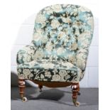 Victorian easy chair, green buttoned brocade upholstery, turned mahogany legs.