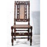 Carolean style carved walnut side chair, coronet cresting, bergere caned panelled back and seat,