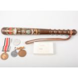 A painted hardwood truncheon, GR Special Constabulary, 1938-1945, and medals.