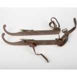 Pair of Victorian steel and brass ice skates, marked Chamberlain Maker Wigston,