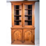 Victorian walnut bookcase cabinet, moulded canopy, double glazed doors,