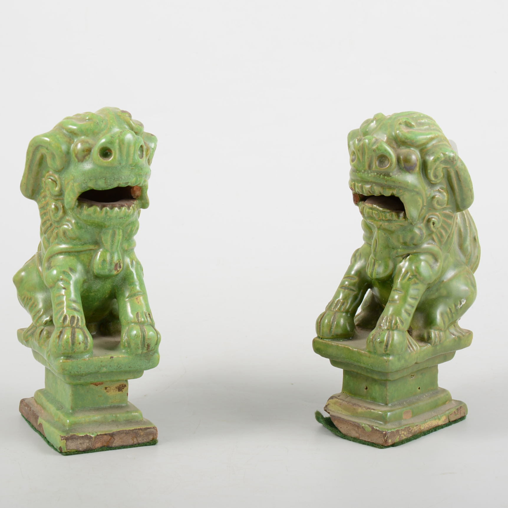 Pair of Chinese glazed pottery Temple Dogs, 14cm.