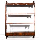 Set of mahogany wall shelves, with three drawers to the base, width 69cm, depth 17cm,