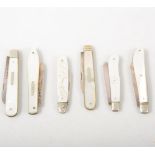 Six Victorian/Edwardian mother-of-pearl fruit knives, all with hallmarked silver blades, overall 5.