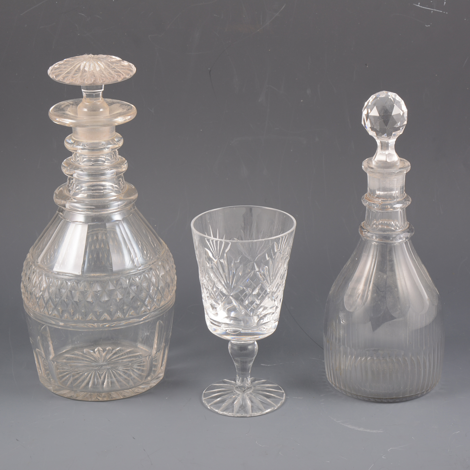 Pair of late Georgian mallet-shape decanters, triple ring necks, later stoppers,