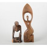 Two African carved wood figures.