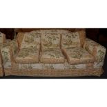 Three seat sofa, with loose cotton covers printed with exotic bird design,
