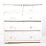 White painted pine chest of drawers, two short and three long graduating, turned handles,