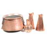 A copper pan, two iron handles, 24cms and three copper jugs, (4).