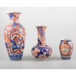 Collection of Imari porcelain, including a lobed charger, plates, vases, bowls, etc, (some damaged).