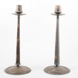 Pair of Art Deco bakelite stylised candlesticks, (one damaged), 26cm.