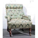 Edwardian easy chair, upholstered in patterned green brocade.